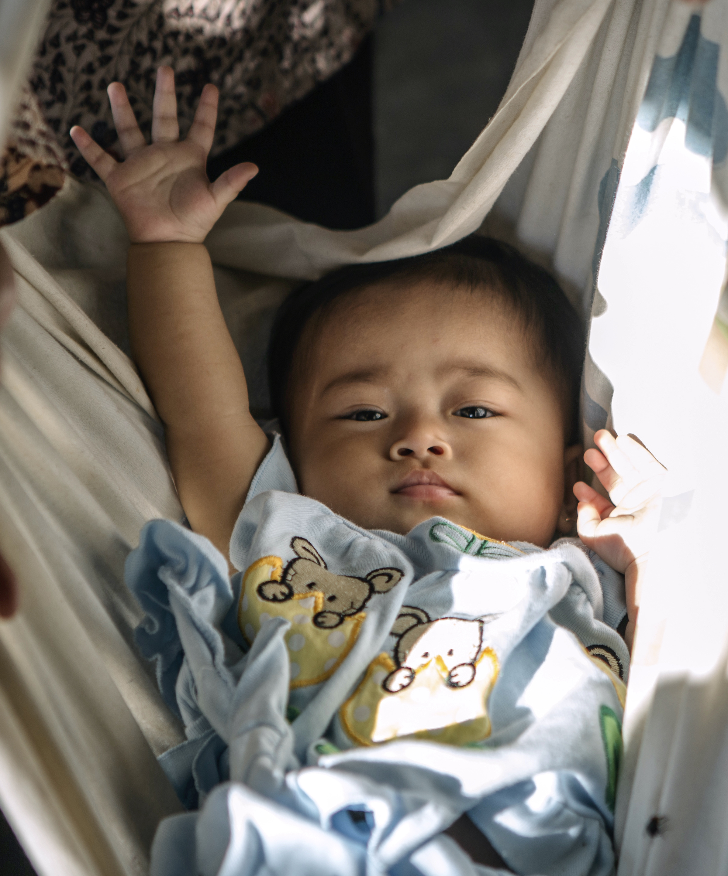 Infant being weighed in Indonesia. Atet Dwi Pramadia/World Bank