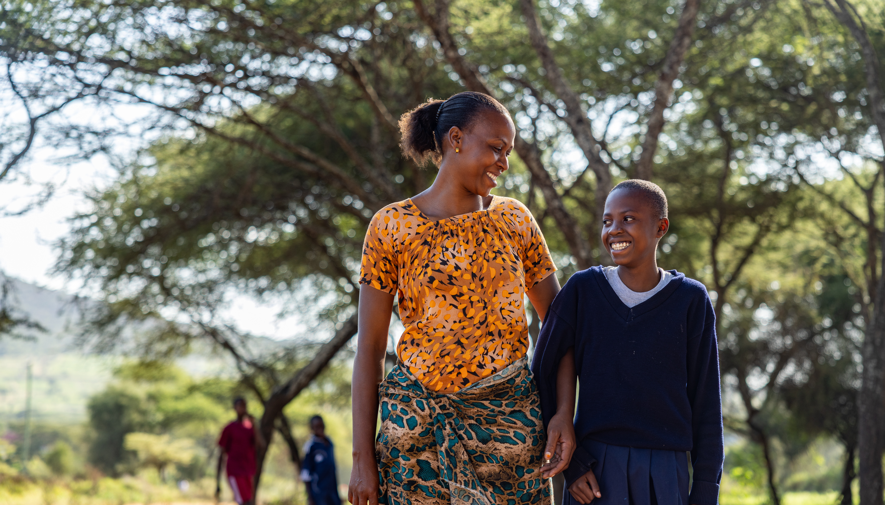 Mother and school-age girl, Tanzania. ©Henri Lombard/World Bank