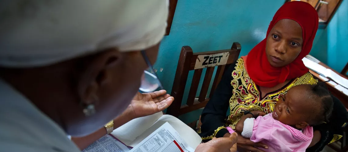 Mother and child at a health facility in Tanzania. Arne Hoel/World Bank