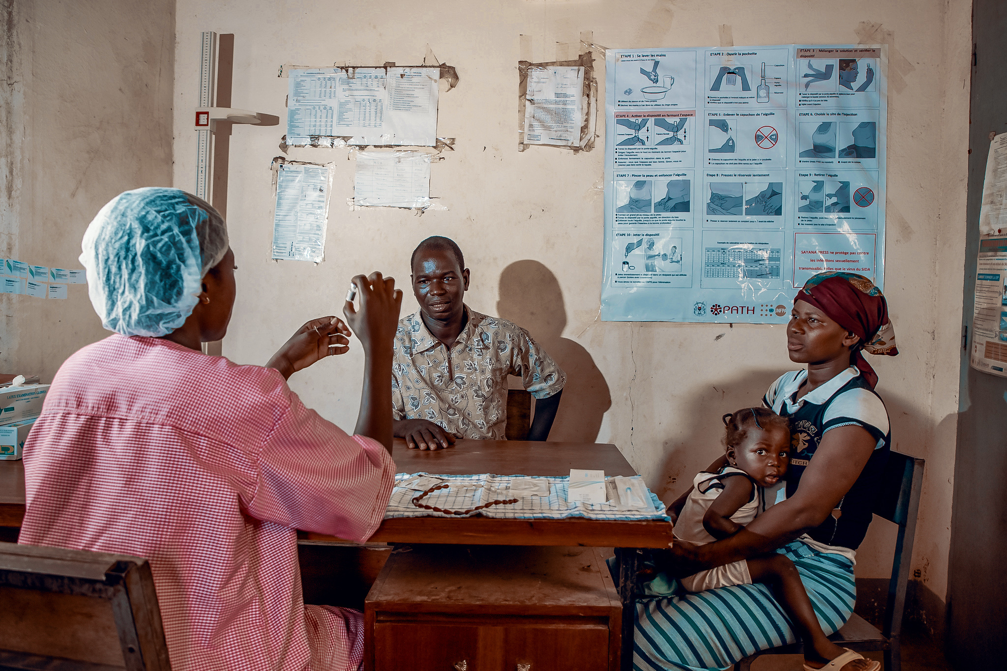 A family at a health center in Burkina Faso. Olivier Girard / World Bank