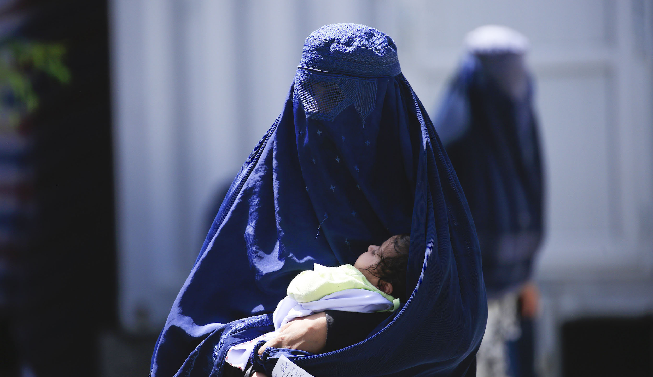 Afghan woman and child