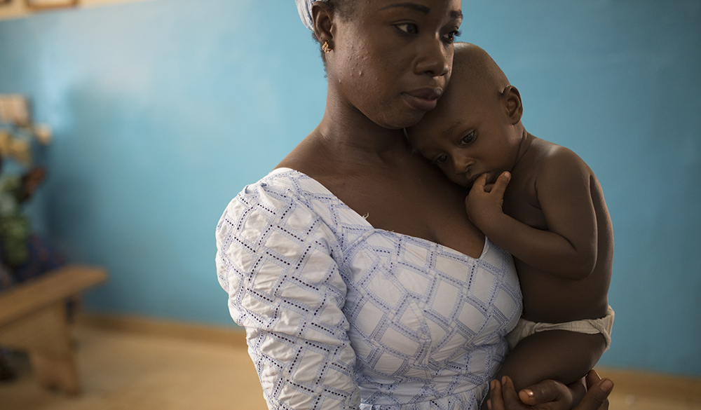 Mother and child at the Urban Medical Center of Samandin, in Ouagadougou, Burkina Faso. Photo © Dominic Chavez / GFF                            