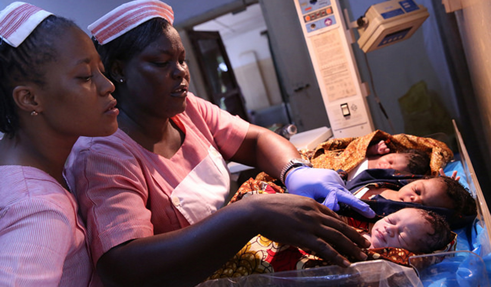 Registered nurses look after newborns at a maternity hospital in Freetown Sierra Leone. 
