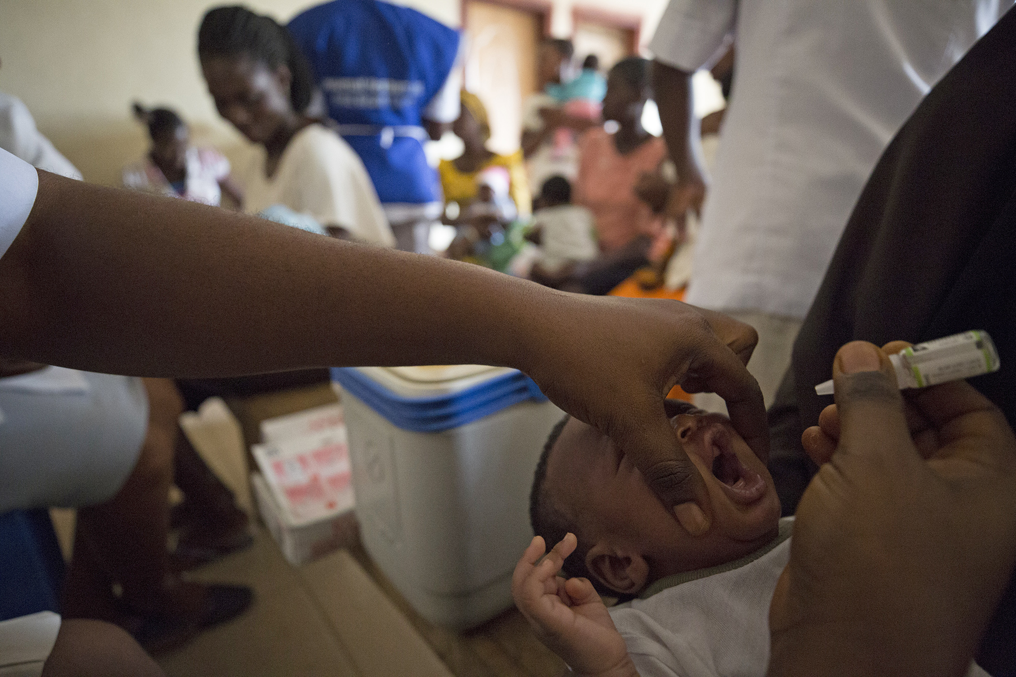 Health care workers vaccinating babies in Akure, Nigeria. Photo © Dominic Chavez/GFF                  