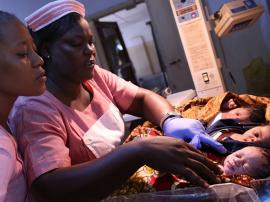 Registered nurses look after newborns at a maternity hospital in Freetown Sierra Leone. 